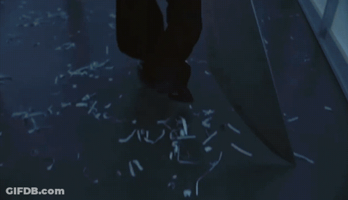 Man Walking Past No Exit Sign GIF
