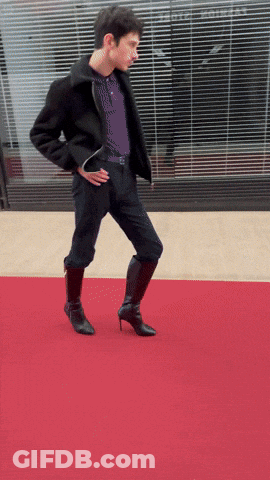 Man Walking Red Carpet In High Heels GIF