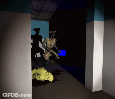 Man Walking Through Dark Hallway With Exit Sign GIF