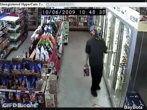 Man Walking Through Store 10/06/2009 GIF