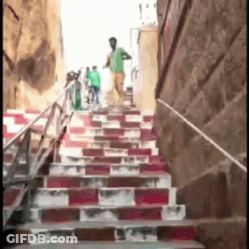 Man Walking Up Stairs GIF