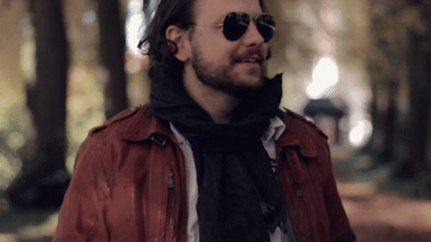 Man Walking With A Toilet Paper GIF