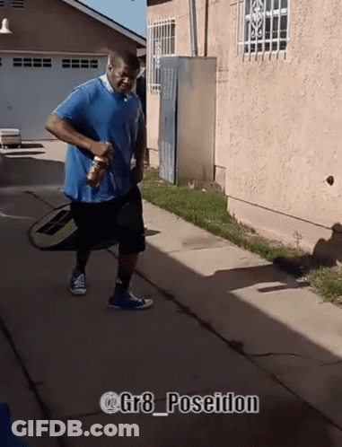 Man Walking With @ Gr8 Poseidon GIF
