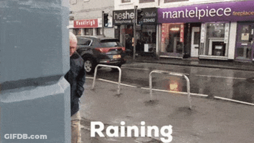 Man Walking With Mantelpiece Sign GIF