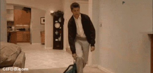 Man Walking With Suitcase And Backpack GIF