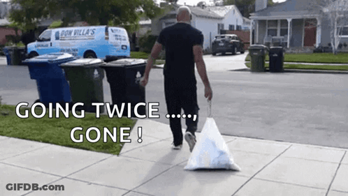 Man Walking With Trash Bag Going Twice Gone GIF