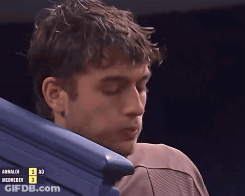 Man Watching Arnaldo Medvedev In Stadium GIF