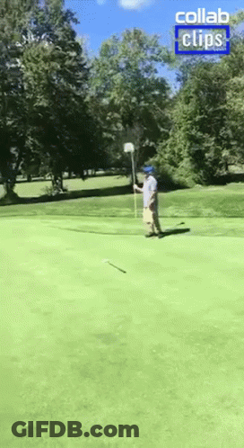 Man Watching Girl Throw Frisbee GIF