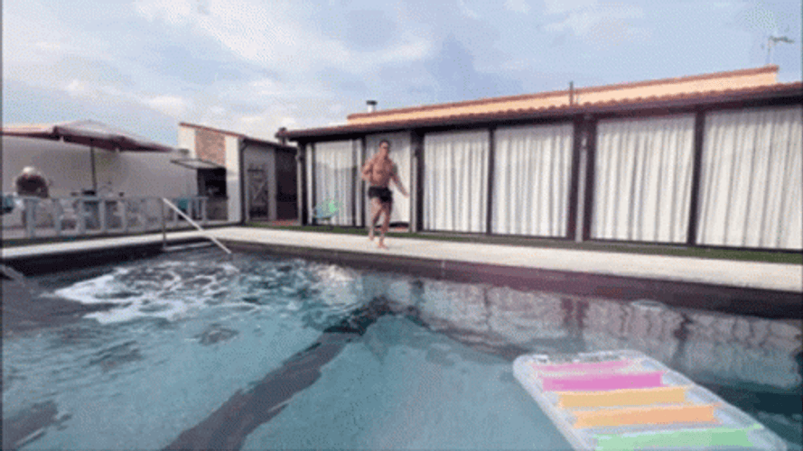 Man Water Pool Cannon Ball Splash GIF
