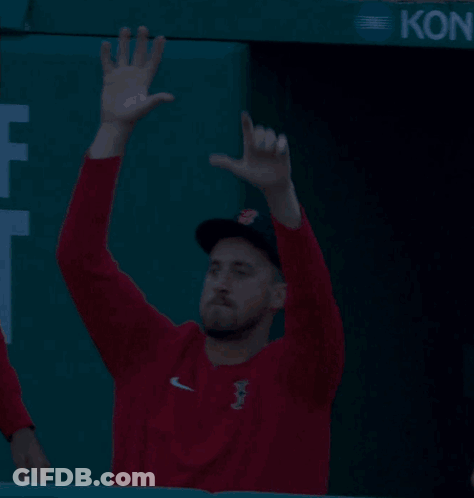 Man Waving In Red Sox Sweatshirt GIF
