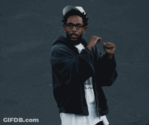 Man Waving In White Jacket And Pants GIF