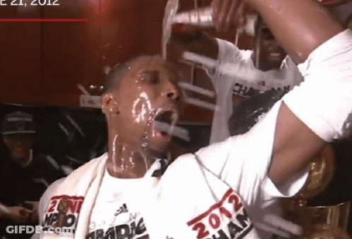 Man Wearing 2012 Champion Shirt GIF