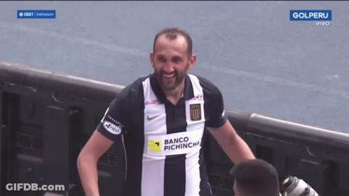 Man Wearing Banco Pichincha Jersey Smiles GIF