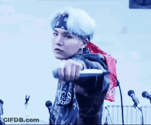 Man Wearing Bandana Holding Microphone GIF