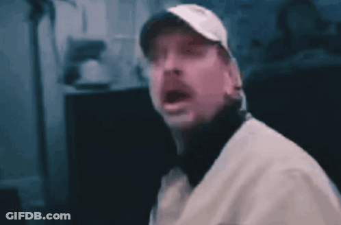 Man Wearing Baseball Cap And Glasses Screaming GIF
