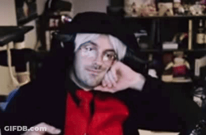 Man Wearing Black Hat And Headphones GIF