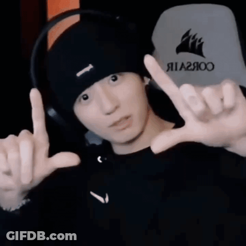 Man Wearing Black Hat And Headphones Making Peace Sign GIF
