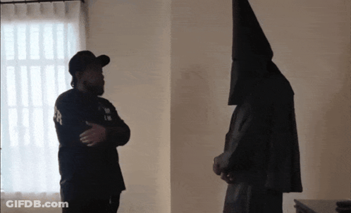 Man Wearing Black Hat With L GIF