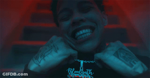 Man Wearing Bloodbath Necklace GIF