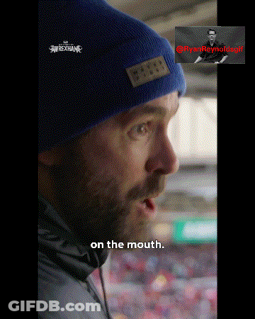 Man Wearing Blue Beanie With Words GIF