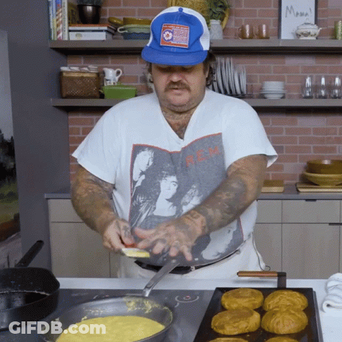 Man Wearing Blue Hat And REM Shirt GIF