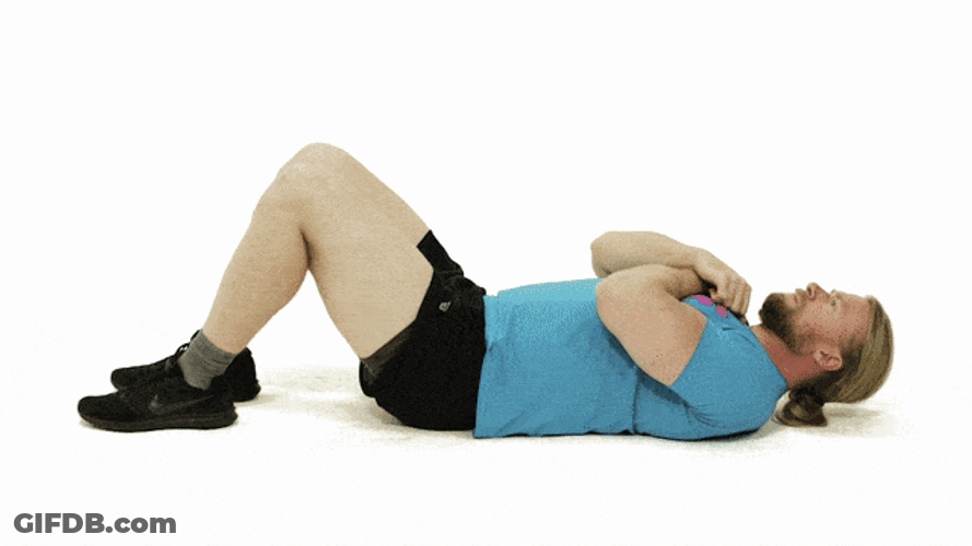 Man Wearing Blue Shirt Doing Crunches Exercise GIF