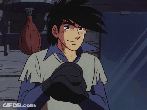 Man Wearing Boxing Gloves In Store GIF