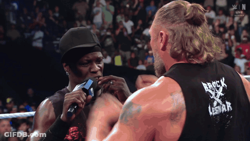 Man Wearing Brick Lestar Tank Top GIF