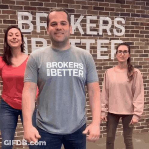 Man Wearing Brokers Better Shirt In Front Of Two Women GIF
