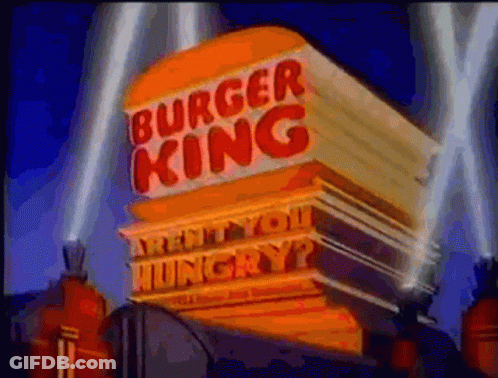 Man Wearing Burger King Crown Surrounded By Hamburgers GIF