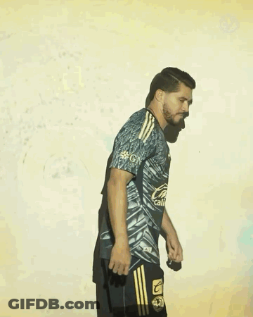 Man Wearing Caliente Shirt GIF