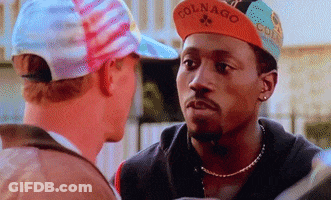 Man Wearing Colnago Hat Looks At Another GIF