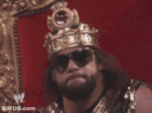 Man Wearing Crown And Sunglasses Sitting In Chair GIF
