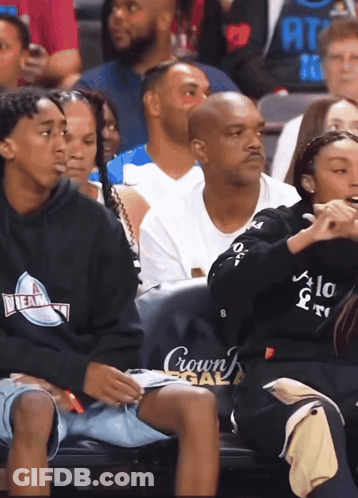 Man Wearing Crown Gala Sweatshirt In Crowd GIF
