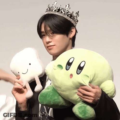 Man Wearing Crown Holding Stuffed Toy GIF
