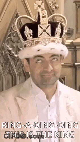 Man Wearing Crown Making Funny Face On Throne GIF