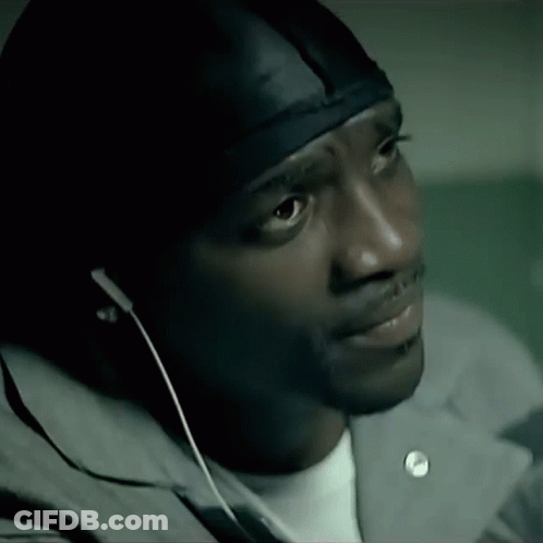 Man Wearing Ear Buds And Headband GIF