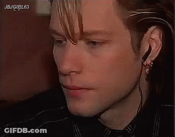 Man Wearing Earbuds And Plaid Shirt GIF