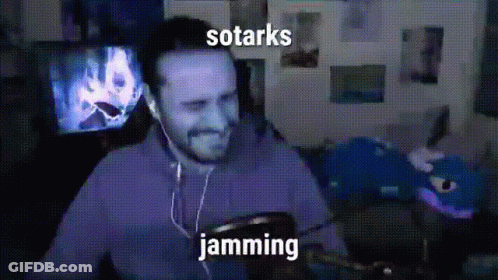Man Wearing Earbuds Listening To Sotarks Jamming GIF