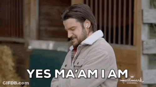 Man Wearing Earbuds Saying Yes Ma'am GIF