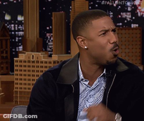 Man Wearing Earrings And Jacket Says Fall On Tonight GIF
