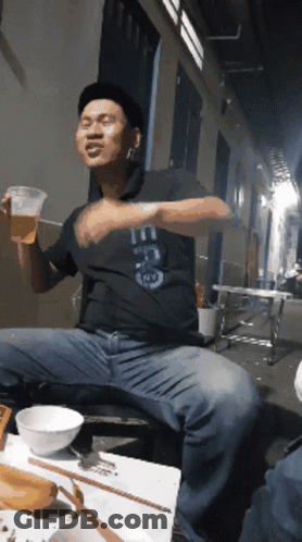 Man Wearing ECG Shirt Holding Beer GIF