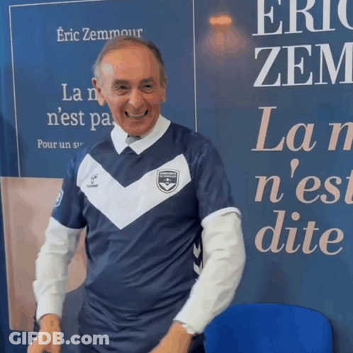 Man Wearing Eric Zemmour Shirt GIF