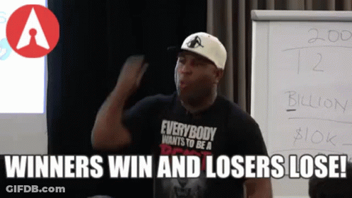 Man Wearing Everybody Wants To Be A Winner Shirt GIF