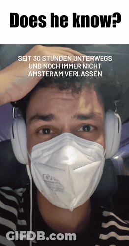 Man Wearing Face Mask And Headphones GIF