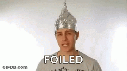 Man Wearing Foil Hat With Foiled Text GIF