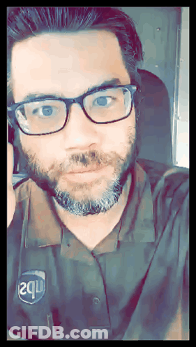 Man Wearing Glasses And 2Q Shirt GIF