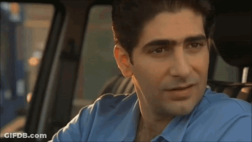 Man Wearing Glasses And Brown Jacket Smiling GIF