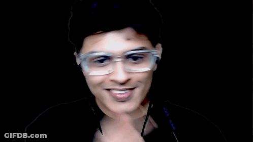 Man Wearing Glasses And Earbuds Giving Middle Finger GIF