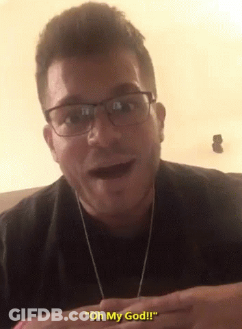 Man Wearing Glasses And Earbuds Saying Oh My God GIF
